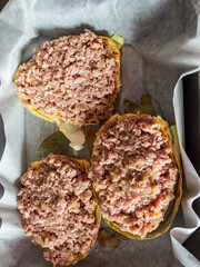 Minced meat casserole layered with cabbage cooked in a pan