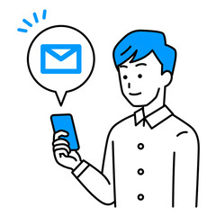 スマートフォンにメールが届くカジュアルな男性