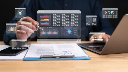 Examines dynamic data visualizations and analytics on multiple screens, highlighting contemporary data-driven decision-making processes scene reflects integration of technology in business strategies
