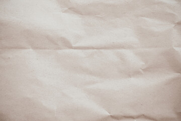 Crumpled brown paper texture background for design with copy space for text or image.	