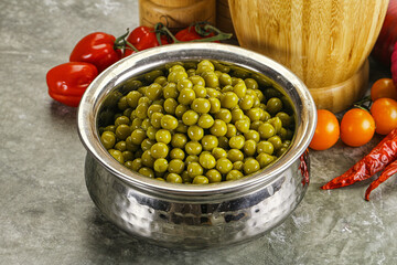 Sweet canned young green peas