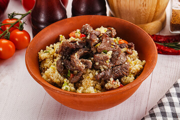 Traditional couscous with beef and vegetables