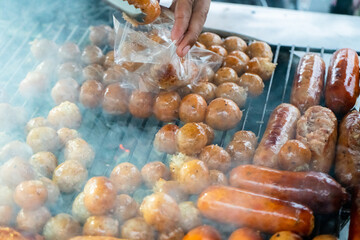 Northeast Thai Grilled Sausages (Pork and Rice Sausage). Street Food of Thailand.