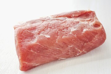 Pieces of pork on a white background