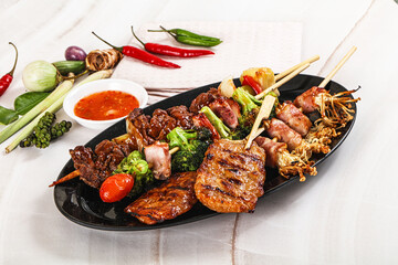 Asian grilled skewer assortment satay