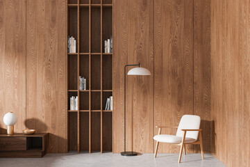 Modern minimalist living room interior with wooden bookshelf, armchair, and decor on a natural wood-paneled wall. 3D Rendering © ImageFlow