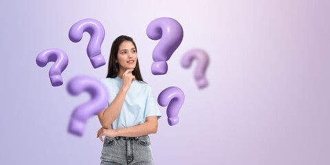 Woman thinking surrounded by purple question marks on pastel bac