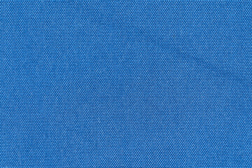 Blue color woven hand abstract fabric pattern for background. Close-up of plain blue surface level textile material, colored background cloth texture for design element. Free copy space