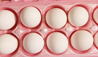 Carton of Fresh Chicken Eggs Close up on Table