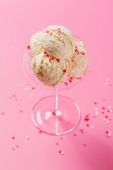 A charming ice cream treat adorned with heart-shaped decor