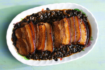 traditional chinese braised pork belly with preserved vegetables