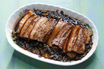 traditional chinese braised pork belly with preserved vegetables