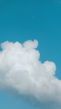Blue Sky White Clouds. Landscape White Clouds. Building Motions Clouds. Summer Blue Sky. Vertical Time Lapse.