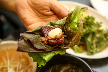 Korean barbecue food. Lettuce and beef wrap