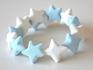 Colorful star-shaped bracelets in pastel tones.