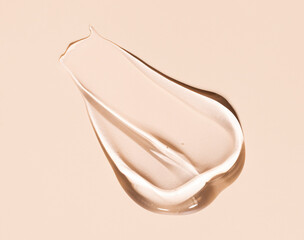 texture gel serum on beige background