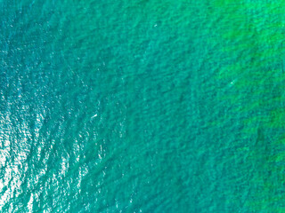 Sea surface aerial view,Bird eye view photo of small waves texture water surface turquoise sea...
