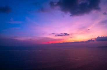 Aerial view sunset sky,Nature beautiful Light Sunset or sunrise over sea,Colorful scenery Sky with Amazing clouds and waves in sunset sky purple light cloud background