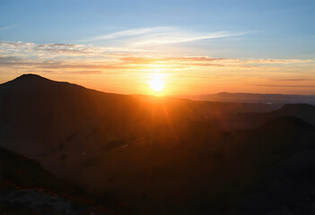 Fototapeta premium sunset over the mountains