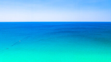 Fototapeta premium Sea surface aerial view,Bird eye view photo of small waves texture water surface turquoise sea background,Beautiful sea nature, Amazing view waves background