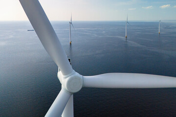 Close up of windmill turbine seen from drone, Windmill turbines generating electric green energy...