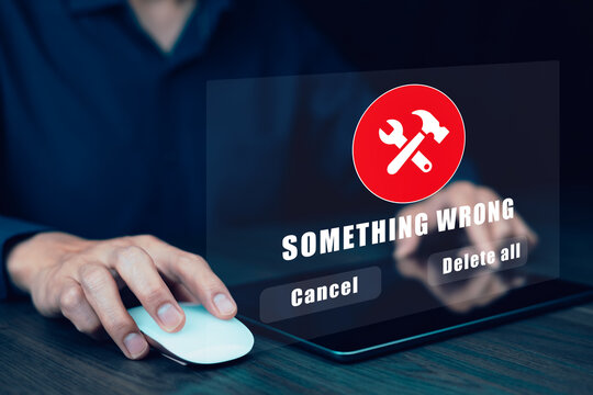 Something Wrong Message on Tablet Computer Display, triangle caution warning sign for notification error system , hacker attacks and hacking data, cyber crime, cyber security
