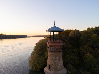 Abandoned Lighthouse on river Danube , Pancevo Serbia. Beautiful mystical landscape on the river at sunset.