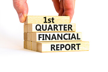 1st quarter financial report symbol. Concept words 1st quarter financial report on beautiful wooden blocks. Beautiful white background. Business 1st quarter financial report concept. Copy space.