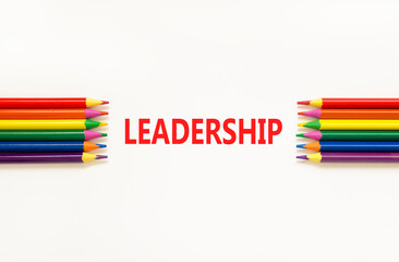 Leadership symbol. Concept word Leadership on beautiful white paper. Beautiful white paper background. Beautiful colored pencils. Business leadership concept. Copy space.