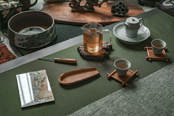 An Elegant Tea Ceremony Setup Featuring Beautiful Traditional Teaware and Accessories