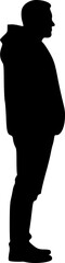 The male figure of a person stands. Black silhouette on a white background. Vector image.