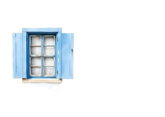 old blue window on wall
