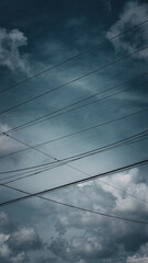 Fototapeta premium blue sky with clouds and powerlines