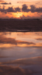 reflection of sunset on the beach
