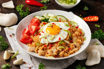 Nasi goreng, fried rice with chicken and egg in Indonesia style. Asian food