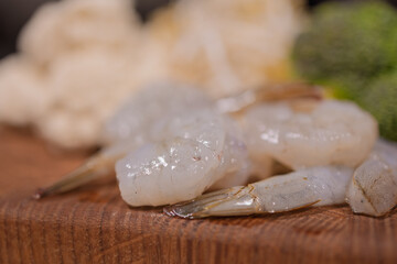 Cooking a dish, vegetables with shrimp and sauces