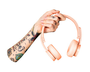 PNG Tattooed arm holding pink headphones, collage element, transparent background