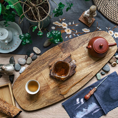 An Elegant and Serene Tea Ceremony Setup Featuring Natural Decor along with Beautiful Teaware