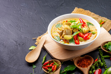 Chicken Green Curry or pork Asian food Thai food on a bowl of soup with a mixture of herbs, vegetables and pepper spices.