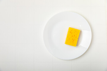 Colorful dish sponges on textured background. Kitchen sponge. Cleaning concept, cleaning service. Dishwashing liquid with clean and dirty dishes plate. Place for text, copy space. Wash the dishes.