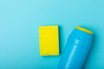 Colorful dish sponges on textured background. Kitchen sponge. Cleaning concept, cleaning service. Dishwashing liquid with clean and dirty dishes plate. Place for text, copy space. Wash the dishes.