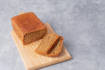 Homemade sourdough bread on neutral grey background