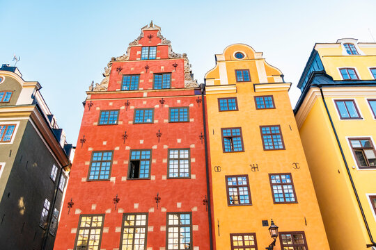 Colorful historic buildings in Stora torget main square, Gamla Stan, Stockholm.