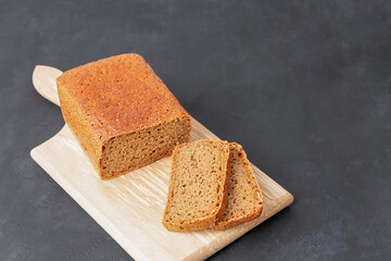 Homemade sourdough bread on dark background