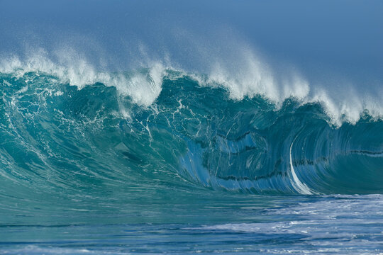 Dramatic big wave crashing in the Pacific Ocean in Oahu, Hawaii. - Powered by Adobe