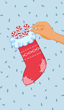 Hand placing candy canes in a red Christmas stocking illustration.
