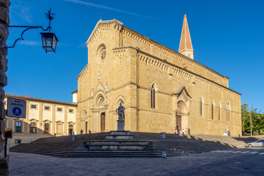 Saints Peter and Donatus cathedral with funeral monument of Guido Tarlati on sunny day in Arezzo, Tuscany, Italy