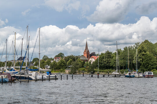 View of Schlei waterfront and St. Ansgar Church in Schleswig, Schleswig-Holstein, Germany.