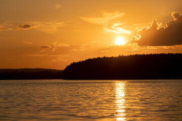 orange sky during sunset on the lake