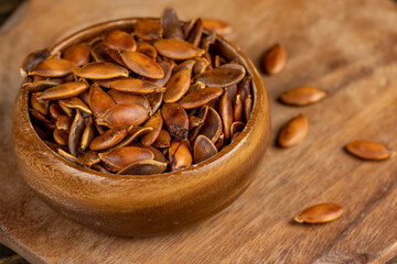 , overcooked or burnt pumpkin seeds on the table